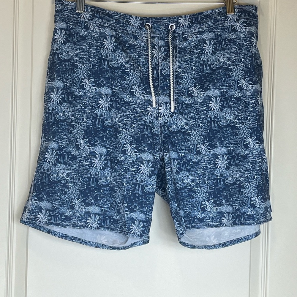 johnnie-O Blue Swim Trunks with Water-Inspired Design